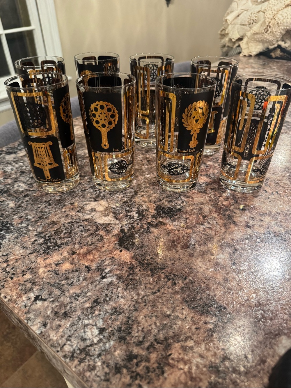 Federal Glass Mid-Century Modern tumblers featuring black and gold designs.